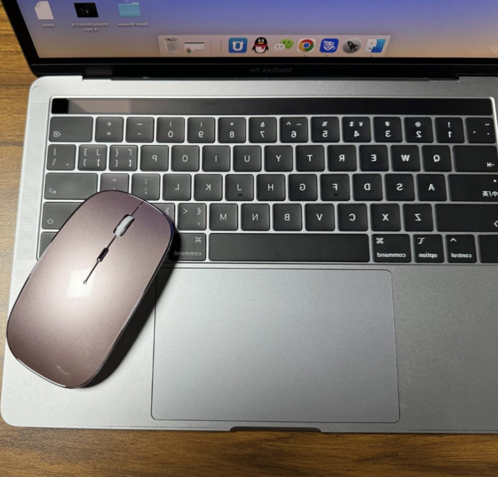 macbook with a wireless mouse